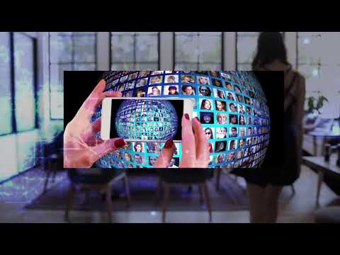 person holding a phone taking a photo of a virtual globe