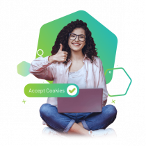girl sitting on computer with thumbs up